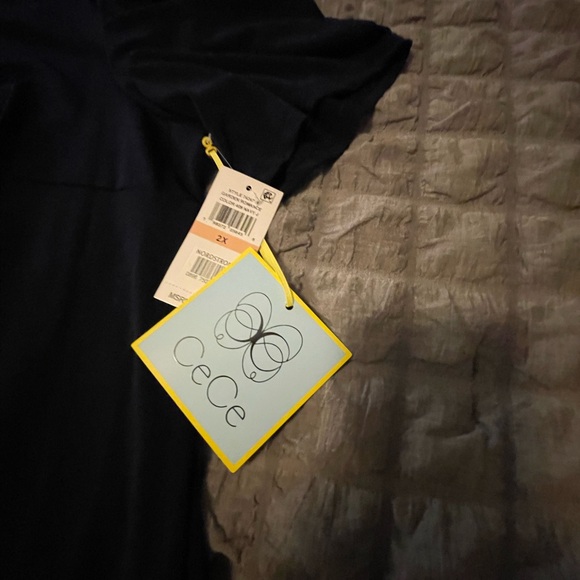 Gorgeous CeCe Navy dress. Size 2x NWT. Puffed sleeve and flounced hem. - Picture 6 of 8
